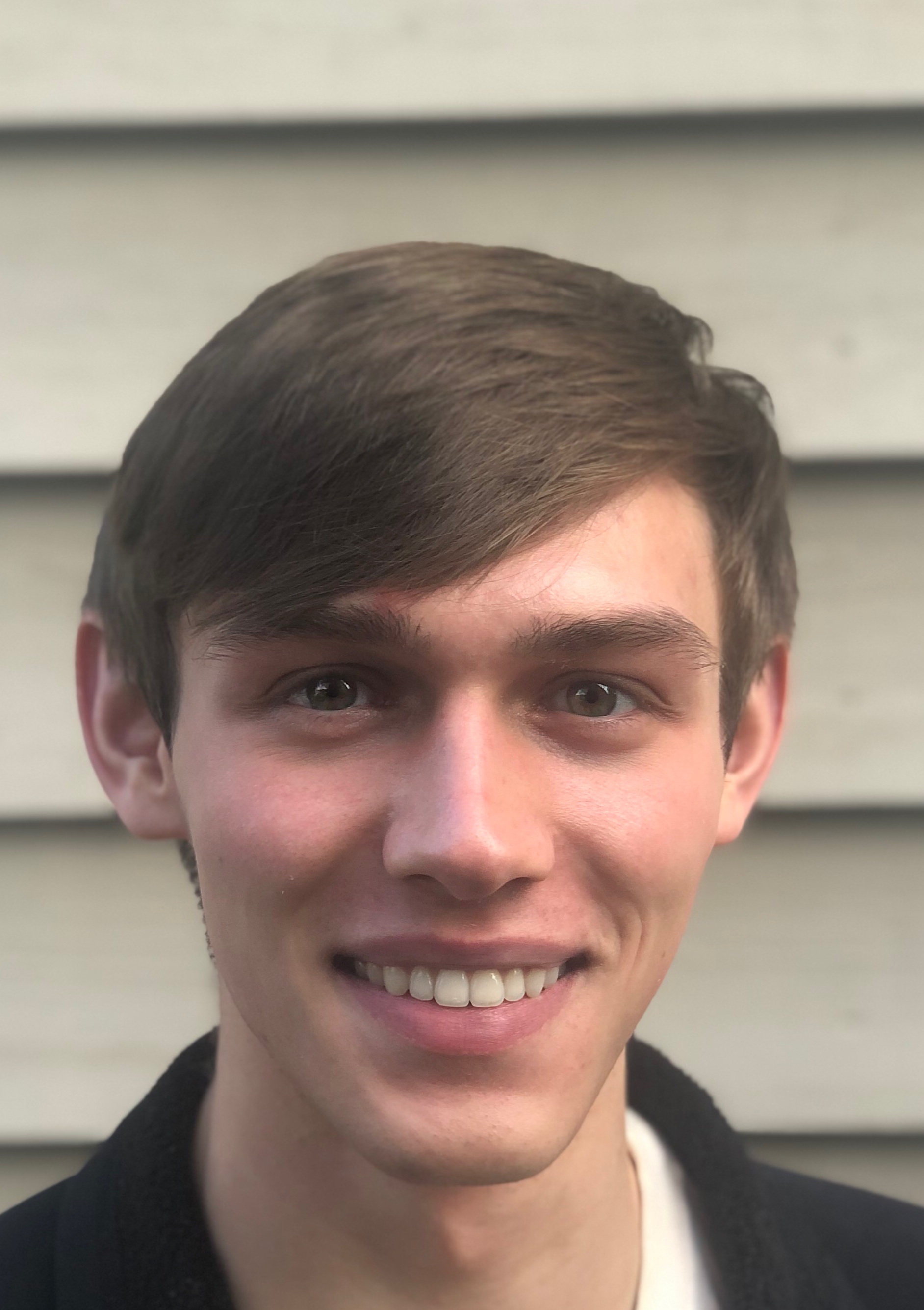 Selfie image of Derek Wagner smiling